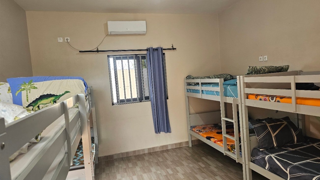 MGIS boarding hostel room with bunk beds and air conditioning